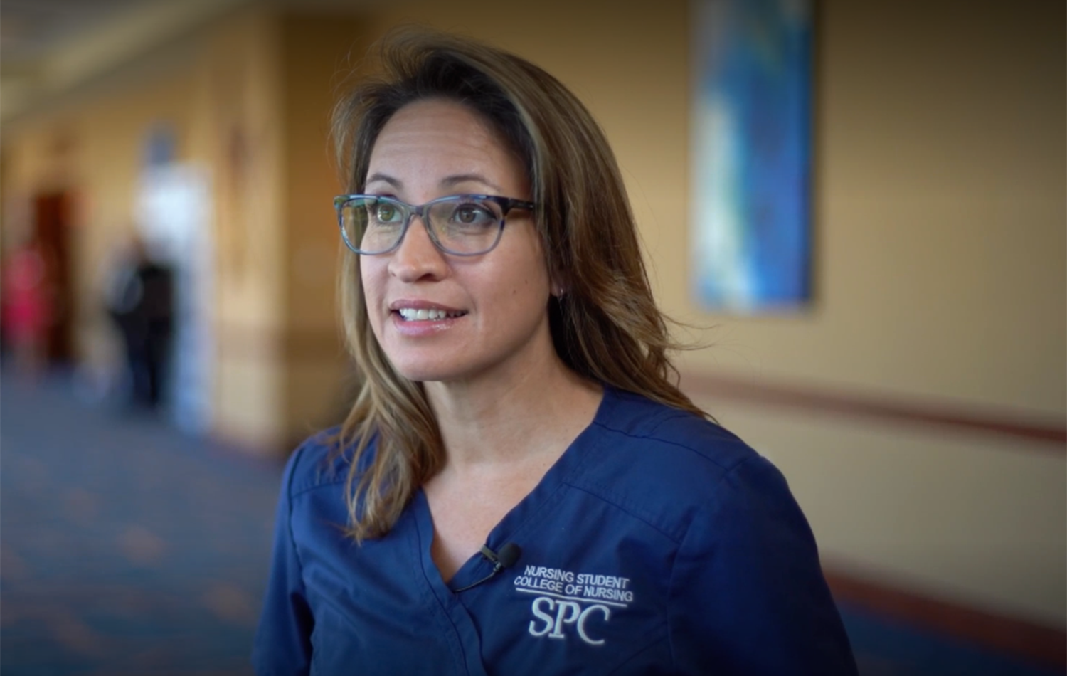 Felicia Brown wearing an SPC Nursing program scrubs during her interview