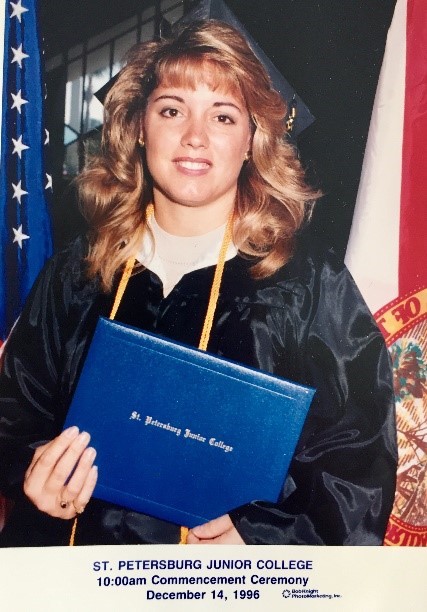 kathleen peters holding SPC diploma at graduation