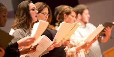 community chorus rehearsing