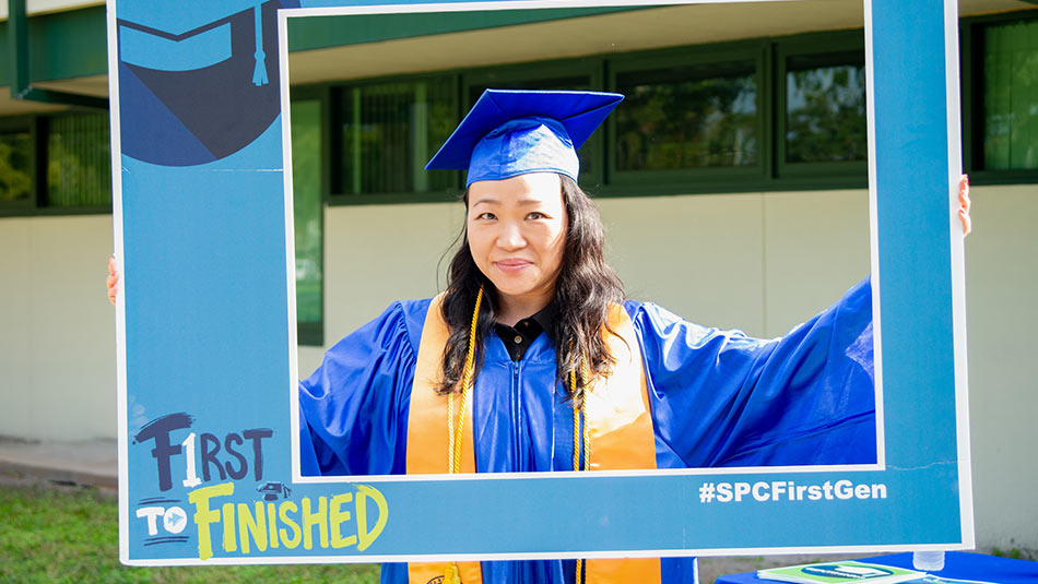 close up view of a First to Finished female graduate