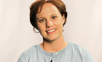 photo of a woman smiling at the camera